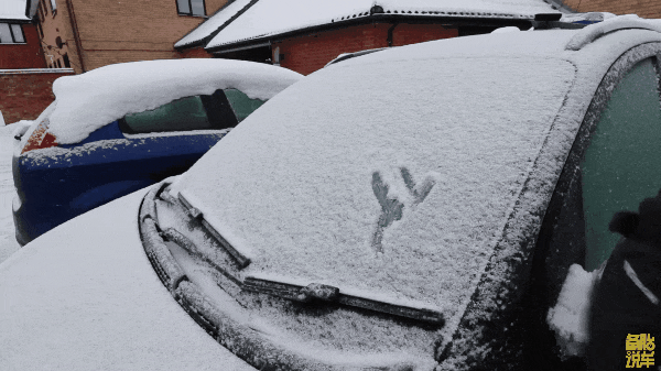 Car driving efficiently on a snowy road