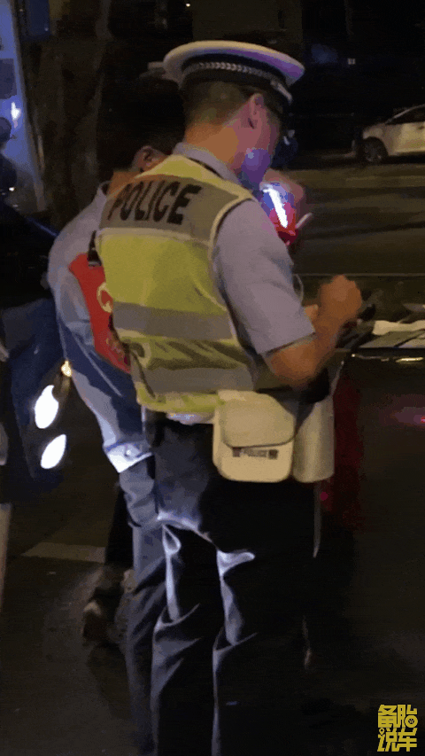 Police officer issuing accident report