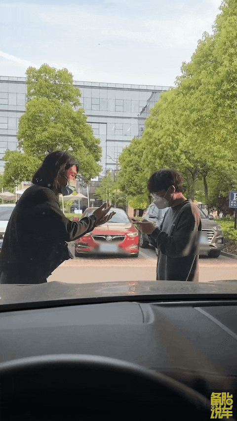 Police officer inspecting dashcam footage